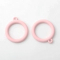 Close-up of matte pink hollow circle alloy pendants for DIY handmade jewelry earrings - Pink