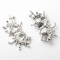 Detail view of double heart crystal charms with liquid metal finish and small rhinestones - Silver White Rhinestone