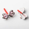 Detail of silver alloy bow earrings featuring pink heart crystals and DIY hanging loops - Pink Silver