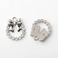 Vue recto-verso du pendentif couronne à nœud en argent avec strass pour bijoux DIY - Argent (Strass)