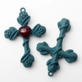 Detailed view of alloy cross pendant with rose reliefs and red heart centerpiece - Dark Green Red