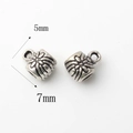 Detalle de cuentas de 5x7mm en aleación de plata antigua con diseño floral y aro - Cuenta de Colgante de Flor