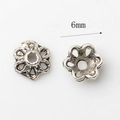 Vista de detalle de cuentas espaciadoras de flor 6mm plata antigua para hacer joyas - Tapa de Flor Espaciadora