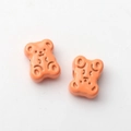 Detailopname van oranje mini beer kralen voor DIY sieraden met fijne reliëfdetails - Oranje