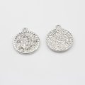Silver flower pendant with lily of the valley relief and rhinestones on both sides - Silver
