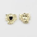 Macro detail of 17mm gold mesh heart charms with black stone and zircons for jewelry making - Black-Gold