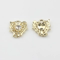 Detailed view of gold alloy heart pendant with mesh cut-out and sparkling zircon stone - White-Gold
