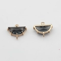 Detailed view of semi-circular smoke grey crystal charms with gold-plated double loops - Black