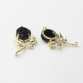 Macro detail of 3D black rose alloy charms with gold leaf base for DIY jewelry making - Black-Gold 01