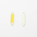 Detail of enamel pencil charms in yellow and beige showing front and back metal texture - Yellow