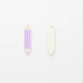 Macro view of light purple enamel pencil pendant with dual-sided detail and hanging loop - Purple