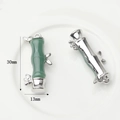 Detailed macro view showing the 30mm x 13mm dimensions of the green bamboo jade pendant - Emerald Green Silver Medium Bamboo Pendant (WSX-1202-08)