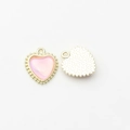 Detail of pink heart charms with gold plated borders for DIY jewelry and earrings - Gold-Pink