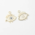 Detailed front and back views of gold evil eye charms with blue zircon inlay and eyelashes - Gold-Blue Zirconia