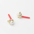 Macro detail of imitation pearl alloy charms with gold metal base and red protective tubes - 10mm*7mm / Gold
