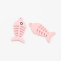 Detail of pink alloy fishbone charms for DIY earring and jewelry making projects - Pink