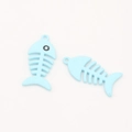 Detail of two light blue fishbone alloy pendants with smooth matte finish for DIY jewelry - Blue