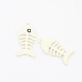 Macro view of cream white fish bone charms with top hanging loops for jewelry making - Off White