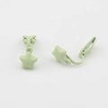 Detail of mint green matte star earring clip for non-pierced ears on white background - Light Green