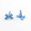 Detailed view of matte sky blue bow-shaped DIY jewelry charms with fine hanging holes - Blue