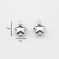 Vista detallada de mini dijes de estrella plateada 10mm x 7mm para creación de joyas DIY - 10mm x 7mm / Collar de Planeta de Estrella Plateado