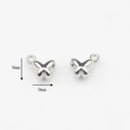 Foto macro de colgantes de mariposa plateados pulidos, tamaño 9mm para joyería artesanal - Mariposa-Plateado