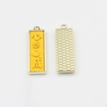 Close-up of golden alloy charm with yellow enamel and embossed Chinese lucky characters - Yellow-Wish Fulfillment
