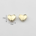 Detalle de cuentas metálicas doradas de 10 mm en forma de corazón para joyas - Corazón
