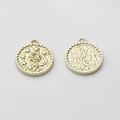 Macro shot of gold-plated round pendants with embossed rose and hammered metal texture - Rose (Gold Plated)