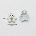 Macro detail of 16mm x 14mm white resin rabbit pendant with green heart and loop for DIY - White Heart Rabbit