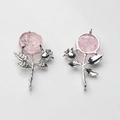 Vue détaillée avant et arrière d'un pendentif rose avec des détails de feuilles d'argent - Rose Argent