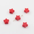 Dettaglio di perle in silicone rosso da 14mm a forma di stella per gioielli fai da te - Rosso