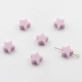 Gros plan de perles en silicone étoile lavande de 14mm avec trou central pour DIY - Mauve Clair