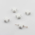 Détail macro de perles en silicone en forme d'étoile de 14 mm avec trou de perçage - Blanc