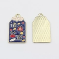 Detailed front and back of rectangular enamel lucky charm with gold motifs and stripes - Everything Goes Well