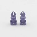 Macro view of purple rabbit enamel pendants with top hanging loops for DIY jewelry - Purple