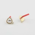 Macro detail of heart pearl earring stud with gold metal base and bottom hanging loop - Gold