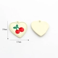 Detail view showing 18x17mm cream heart charm with cherry pattern for DIY jewelry - Cherry (Cream Heart)