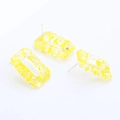 Detail of rectangular resin earring components with yellow splatter and silver pins - Yellow