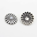 Macro view of retro silver daisy concho buttons with white turquoise stone center - Marble White