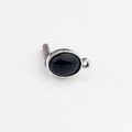Close-up of vintage oval black resin stone pendant with silver metal frame for DIY jewelry - Black-Silver