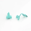 Detail of matte light blue bow clip-on earrings with spring clasp on white background - Green