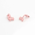Detail view of pink matte bow clip-on earrings for DIY jewelry making and non-pierced ears - Pink
