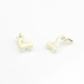 Detail of cream matte bow ear clip accessory made of alloy for non-pierced ears - White