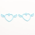 Close-up of light blue winged heart alloy charms for DIY jewelry and crafts making - Blue