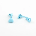 Close-up of matte light blue heart-shaped ear clips with U-shaped non-piercing backs - Blue