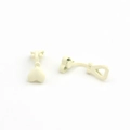 Close-up of heart-shaped cream matte alloy clip-on earrings for non-pierced ears - White