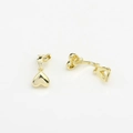 Detailed close-up of golden heart-shaped clip-on earrings with a polished glossy finish - Gold