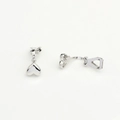 Detailed macro view of polished silver heart pendants with a sleek mirror finish - Silver