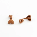 Macro detail of brown geometric heart-shaped matte resin ear clips for DIY jewelry - Brown